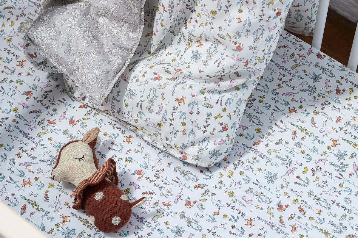 nursery and baby bedding collection made with liberty fabric by coco and wolf
