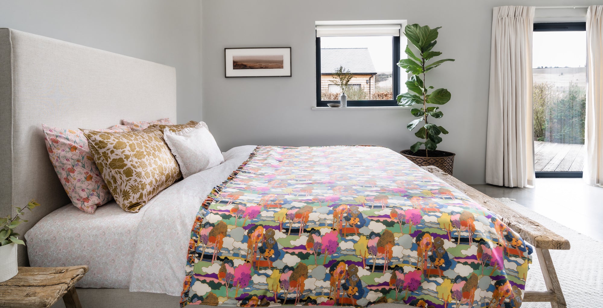 Bedspreads and throws in Liberty fabrics by Coco & Wolf