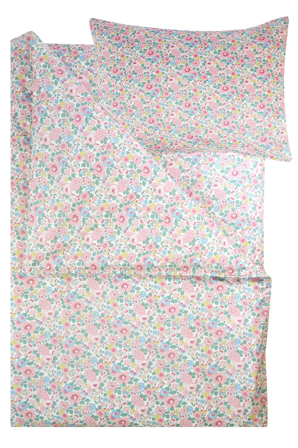 Luxury bedding made with Liberty fabric by Coco & Wolf