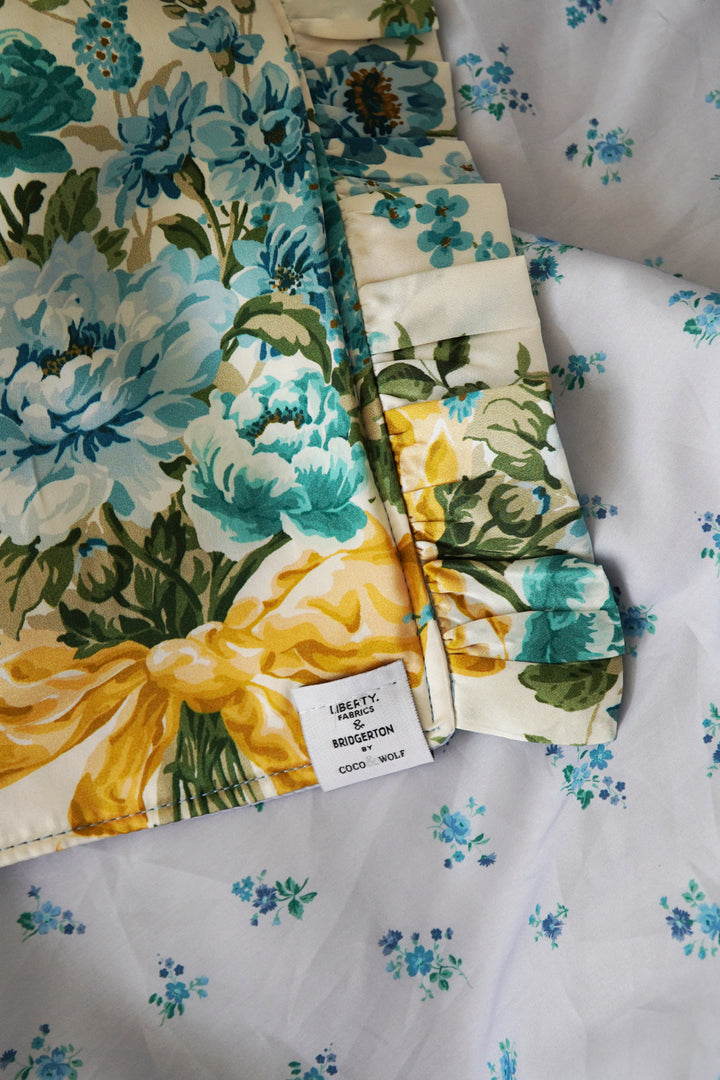 Bridgerton Reversible Ruffle-Edge Bedspread made with Liberty Fabric BOW BOUQUET GOLD & POSEY CORSAGE BLUE